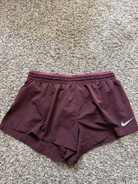 Nike Women’s Maroon Athletic Shorts with White Swoosh